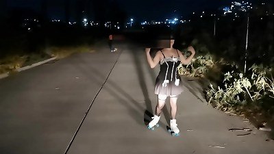 Masturbating in public, using skates and lingerie