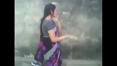 indian molten aunty in saree outdoor blow and hooter press