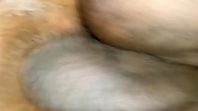 Fucking a young hooker raw from the back.